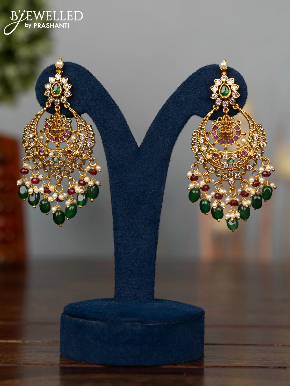 Antique earrings lakshmi design with kemp & cz stones and pearl & green beads hangings