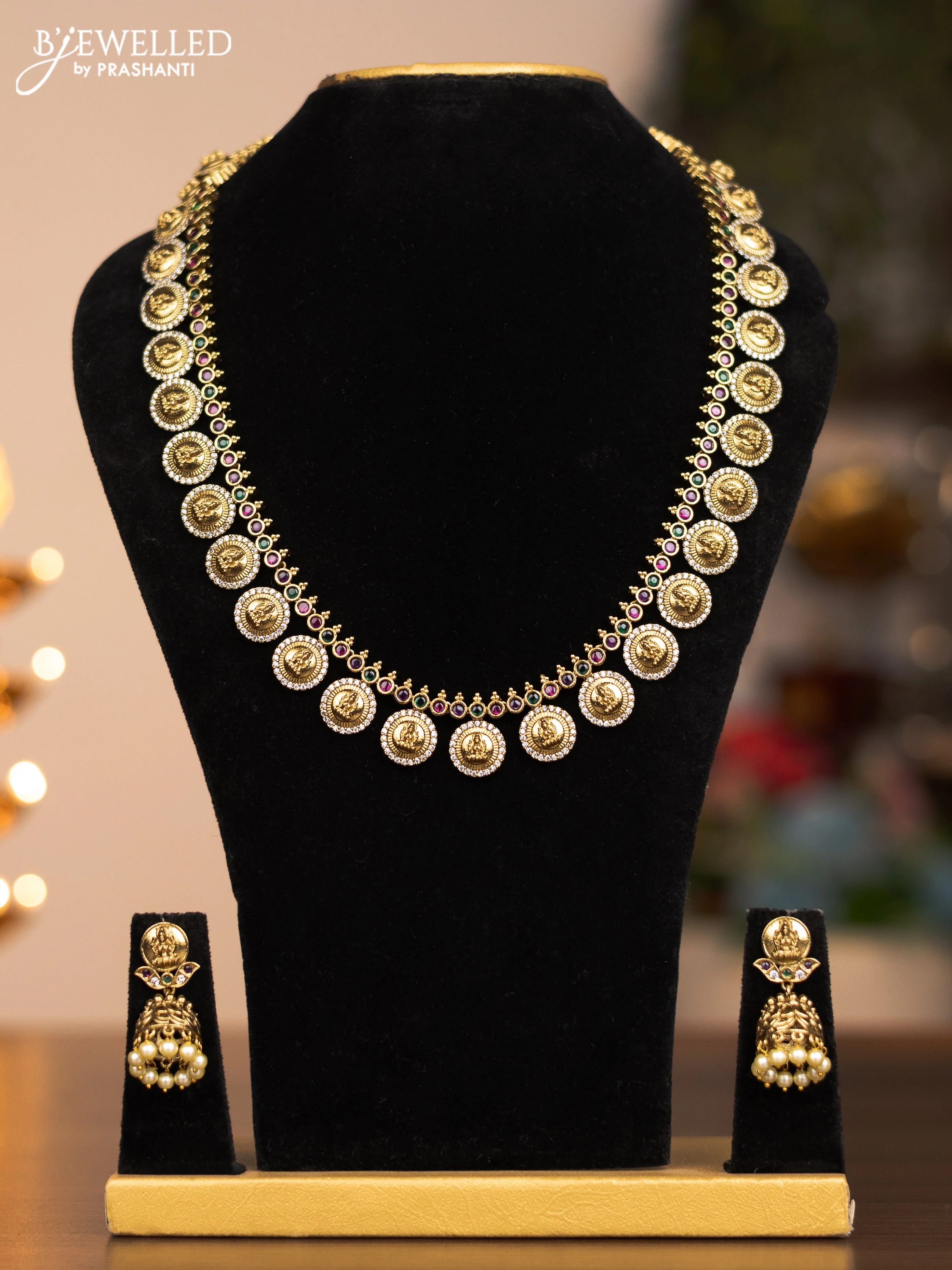 Antique haram lakshmi kaasu design with run and emerald stones