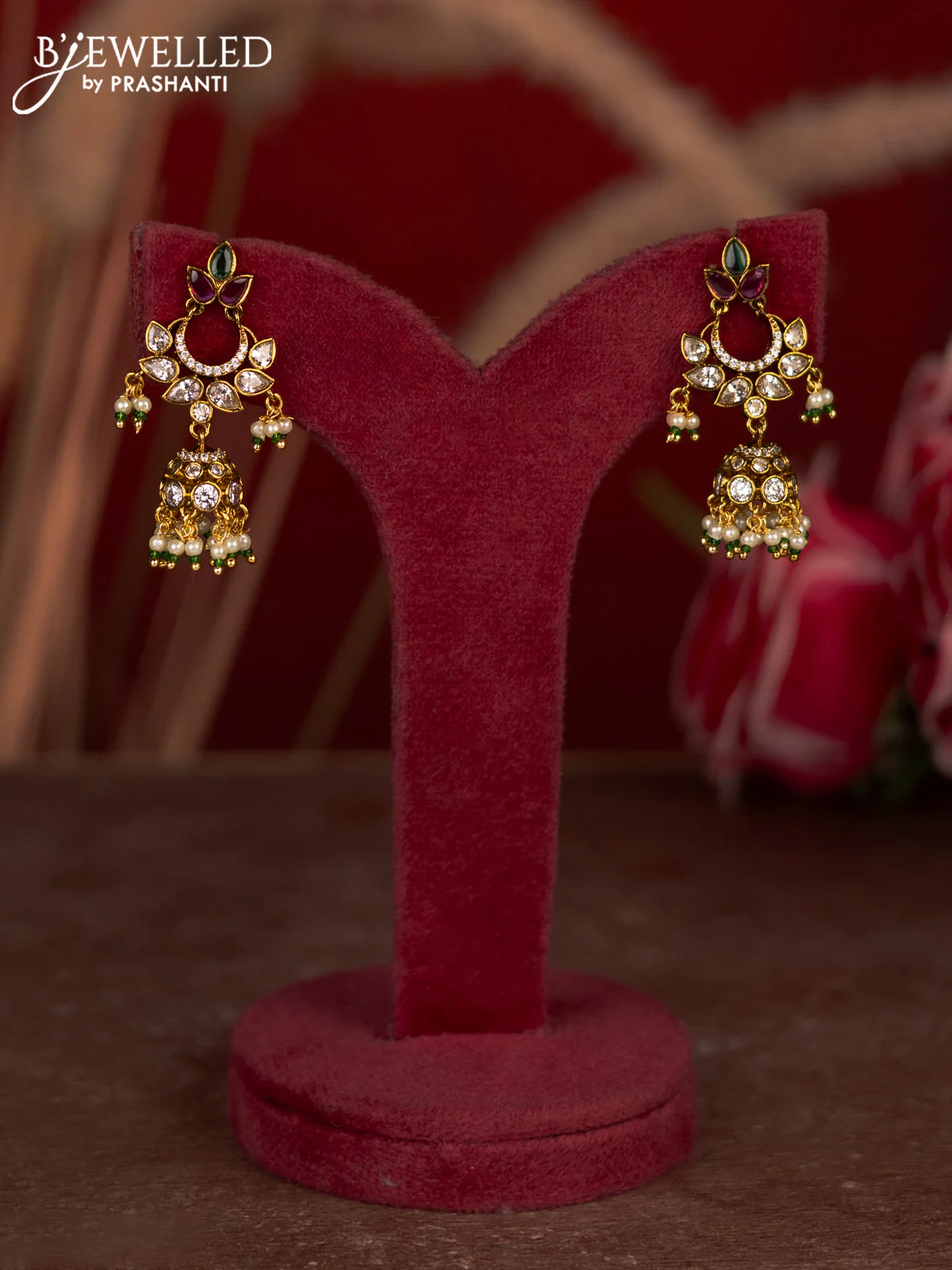 Antique jhumkas with kemp & cz stones and pearl hangings