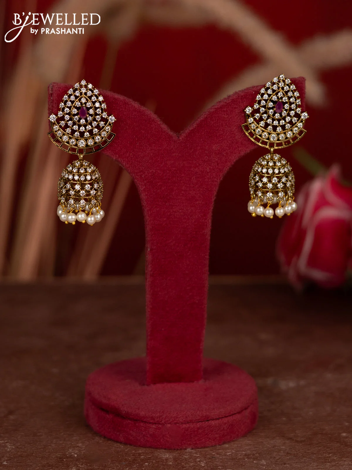 Antique jhumkas with ruby & cz stones and pearl hangings