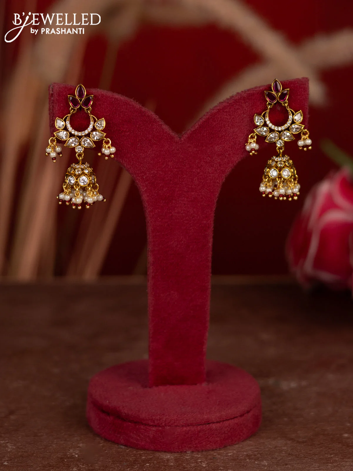 Antique jhumkas with ruby & cz stones and pearl hangings