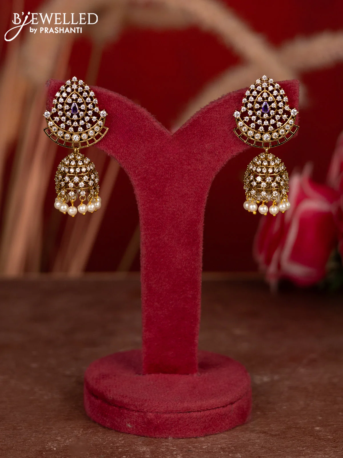 Antique jhumkas with violet & cz stones and pearl hangings