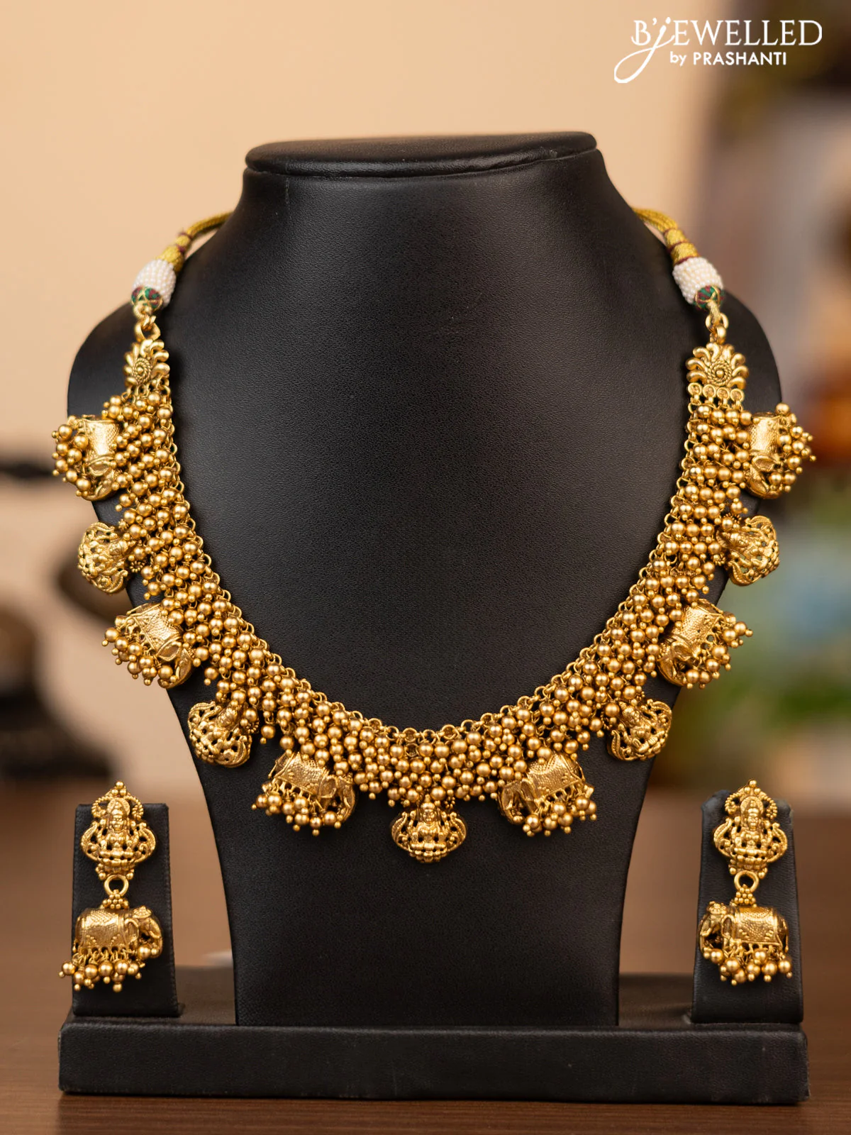 Antique necklace with lakshmi & elephant design and golden beads hanging