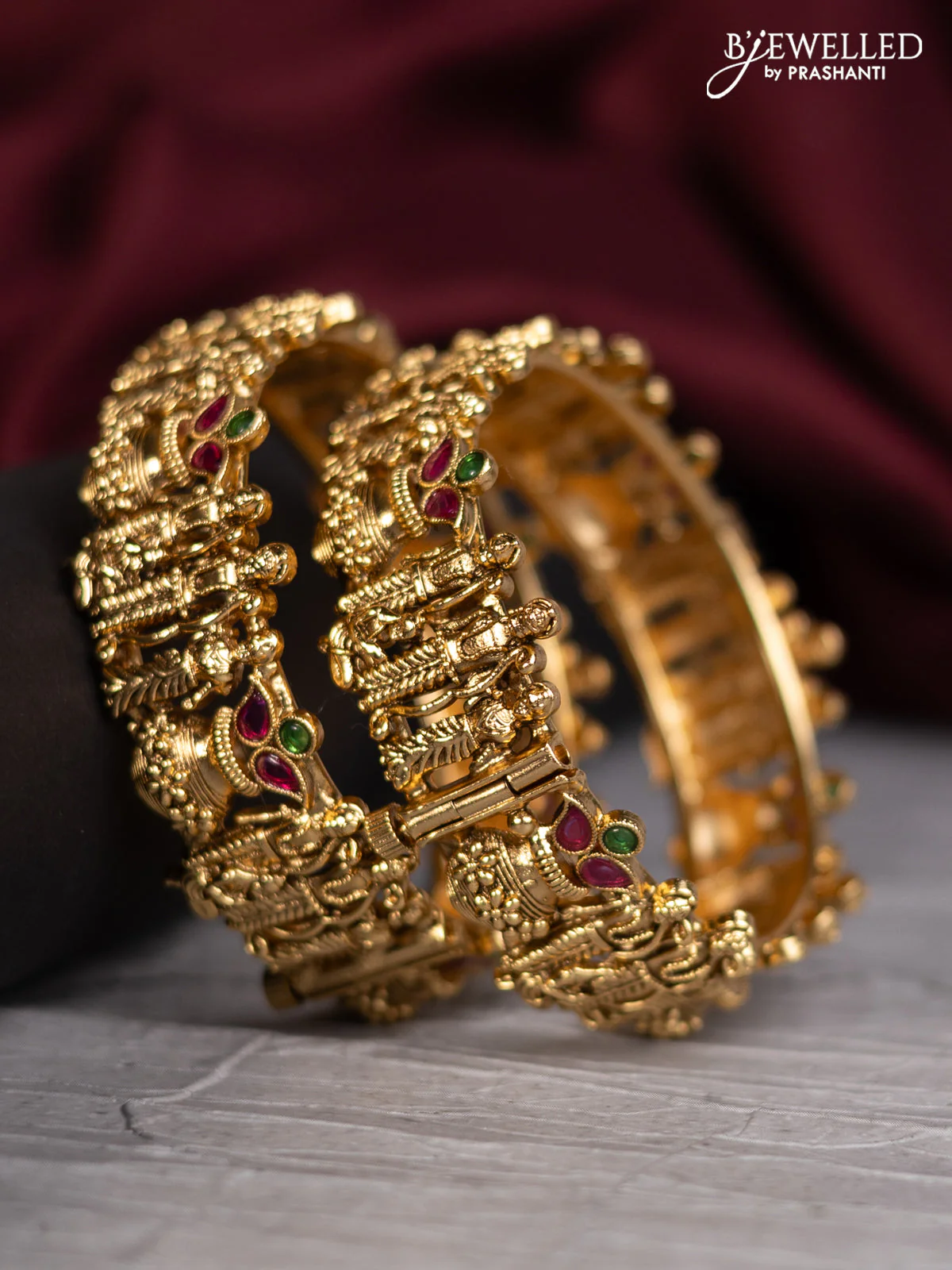 Antique screw type bangles with ram darbar & kalashs design and kemp stones