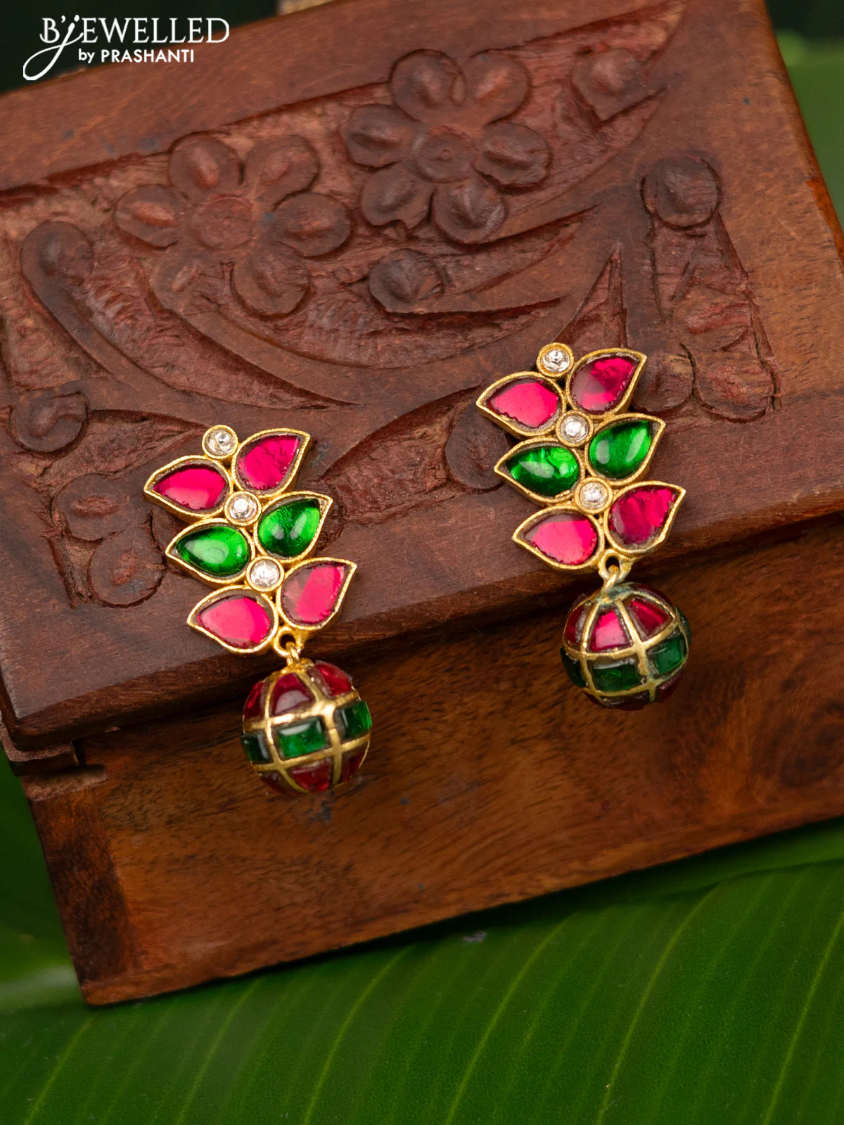Antique screw type earrings with jadau kundan stones