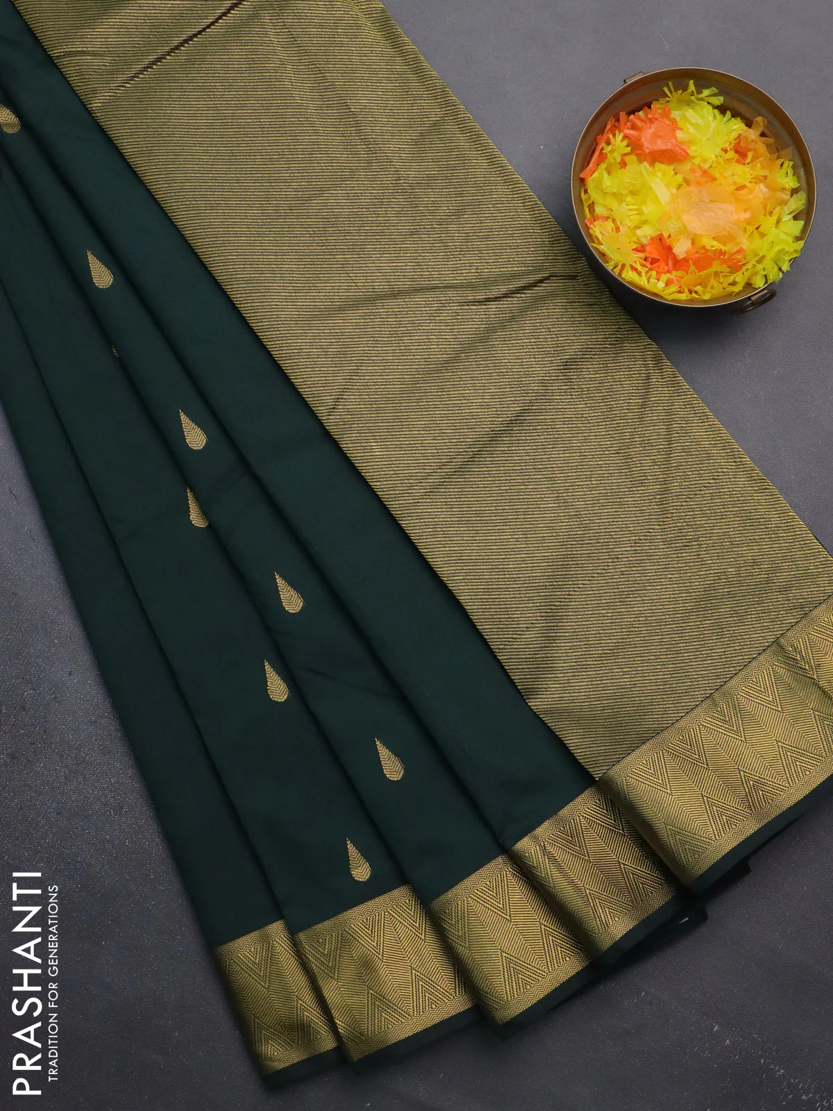 Arani semi silk saree bottle green with zari woven thilak buttas and zari woven border