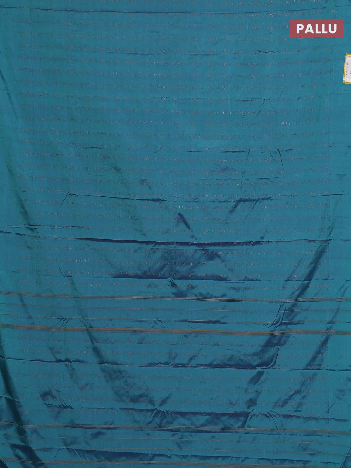 Arani semi silk saree dual shade of teal green with allover copper zari weaves in borderless style - Image 3