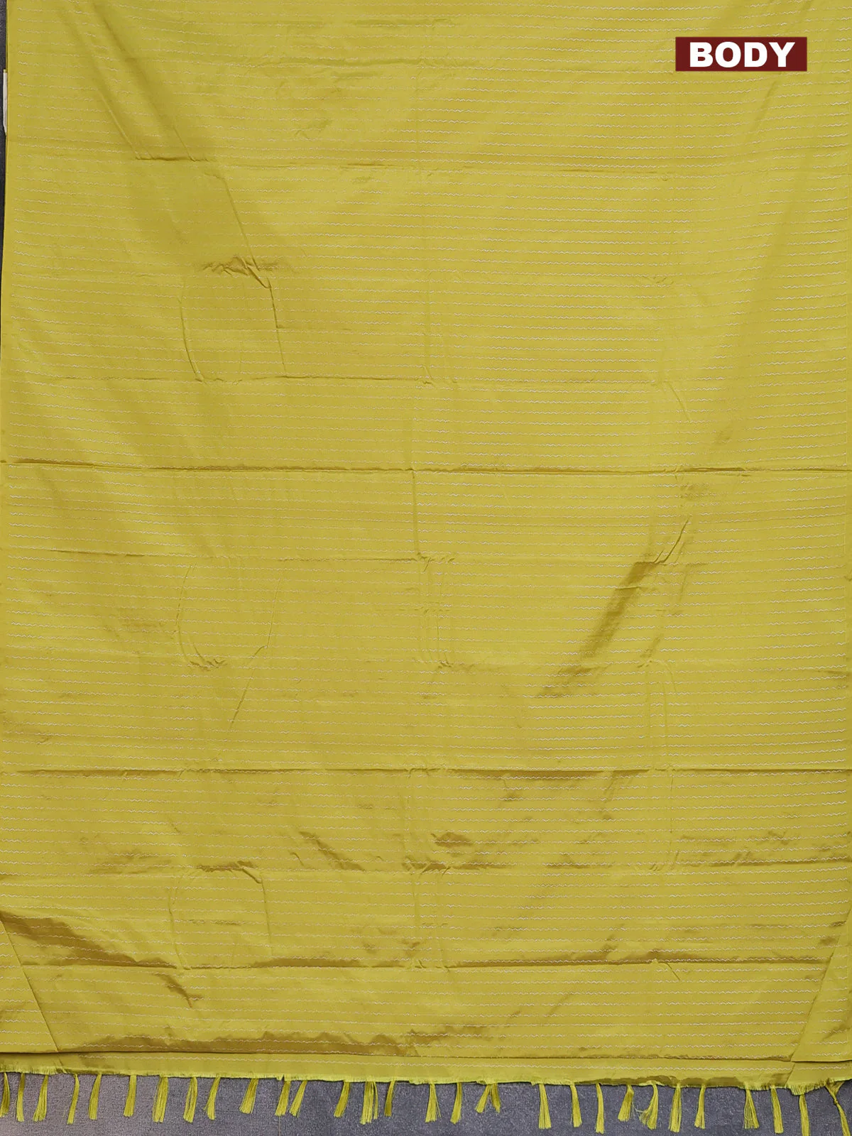 Arani semi silk saree lime yellow with allover silver zari weaves in borderless style - Image 2