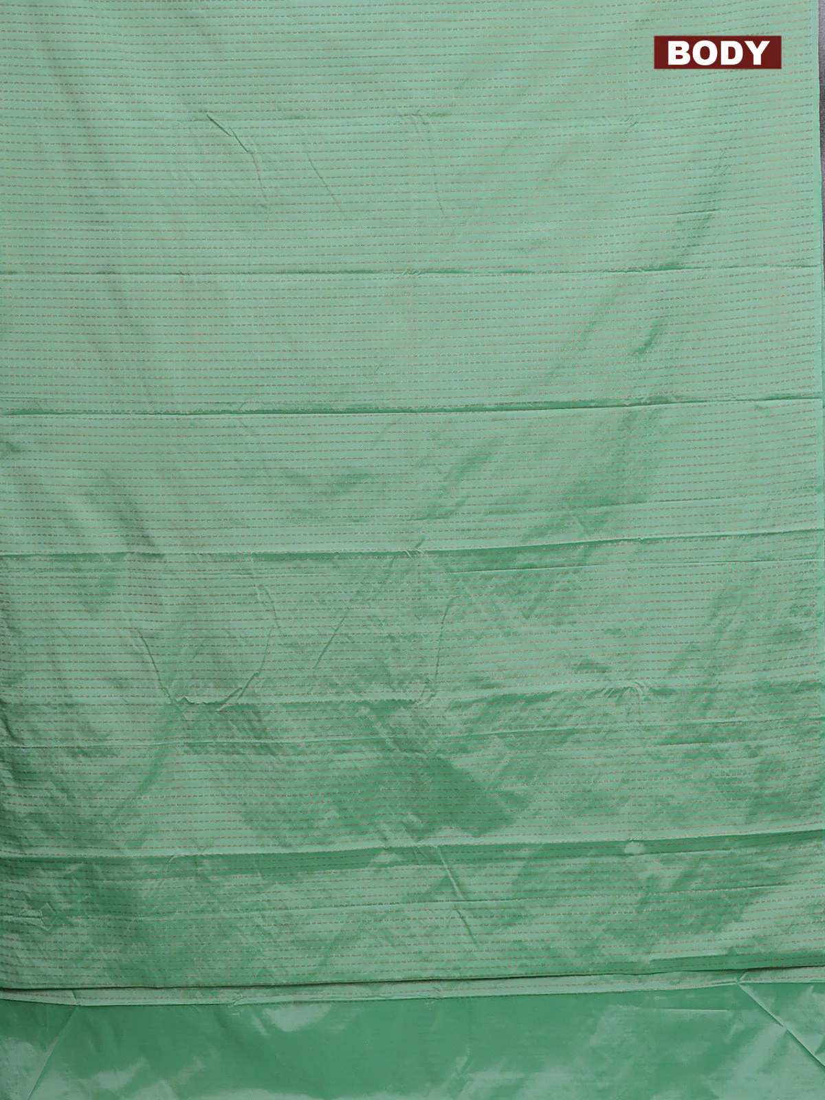 Arani semi silk saree pastel green with allover copper zari weaves in borderless style - Image 2