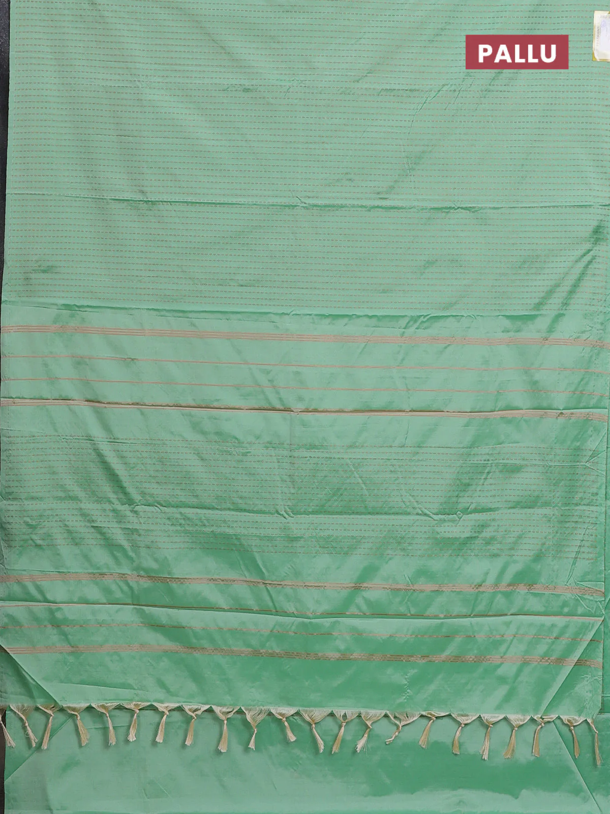 Arani semi silk saree pastel green with allover copper zari weaves in borderless style - Image 3
