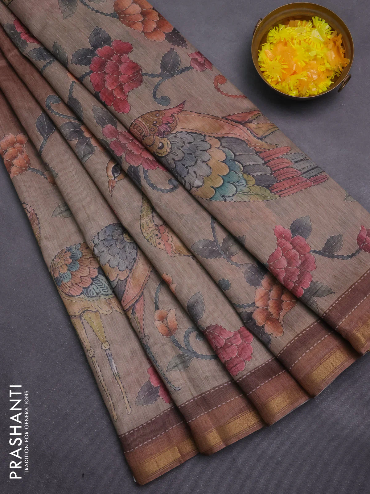 Art linen saree brown and pastel green with plain body and printed pallu