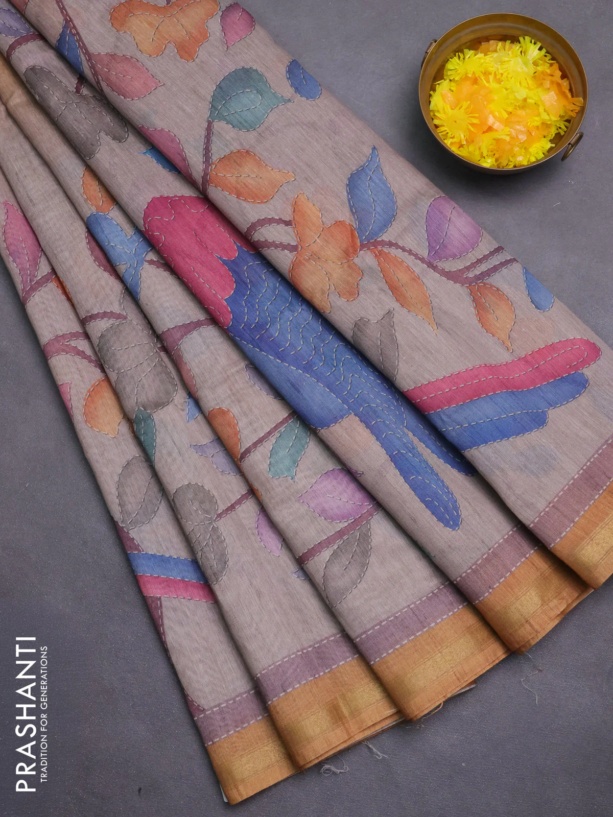 Art linen saree mustard shade and pastel grey with plain body and printed pallu