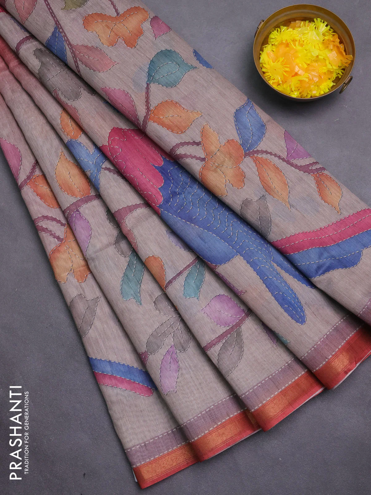 Art linen saree pastel brown and pastel grey with plain body and printed pallu