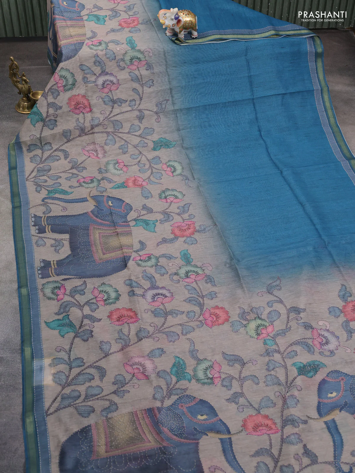 Art linen saree peacock blue and pastel grey with allover kalamkari prints and zari woven border - Image 2