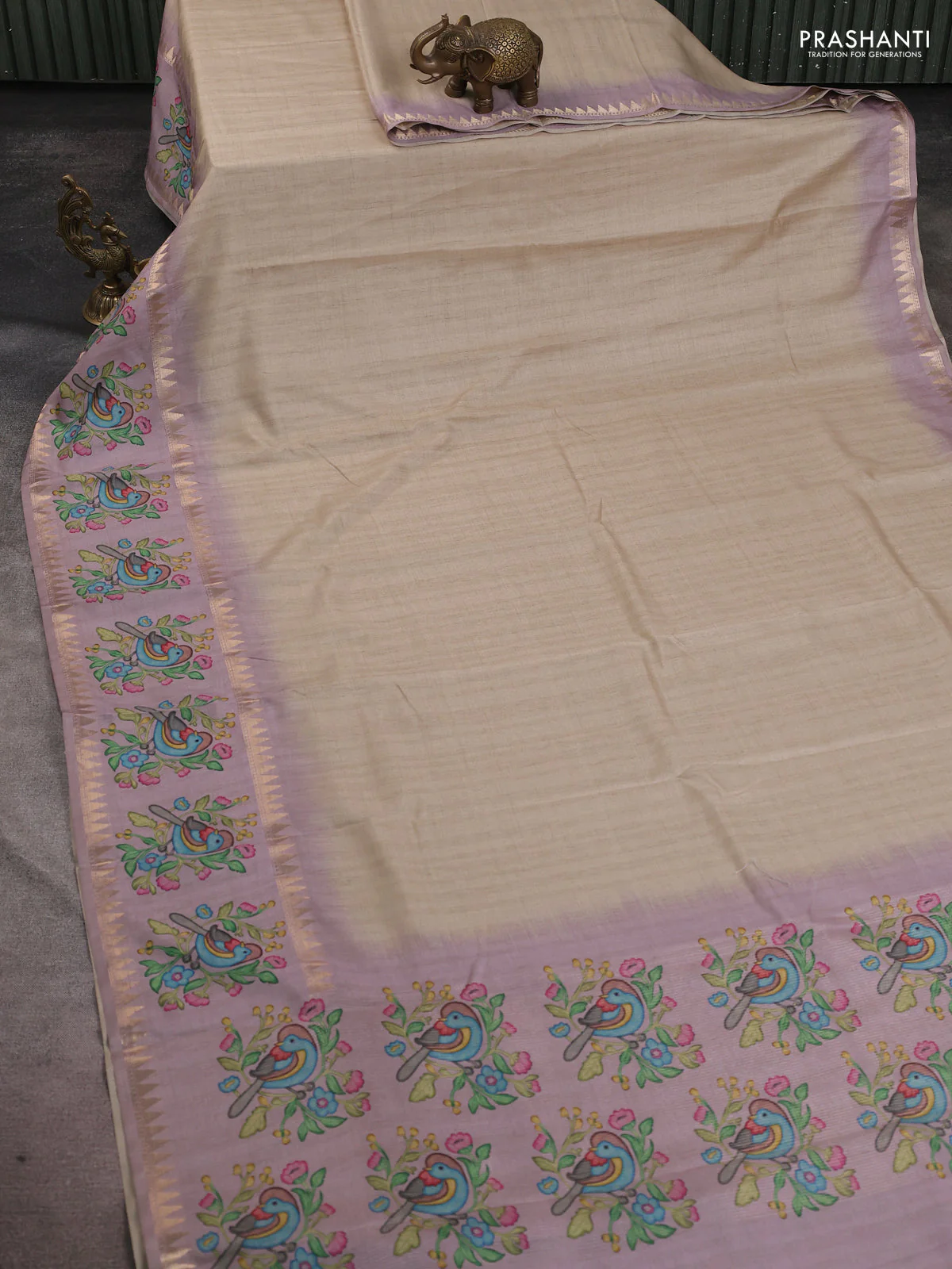 Art tussar saree beige and pastel purple with plain body and tanjore printed border - Image 2