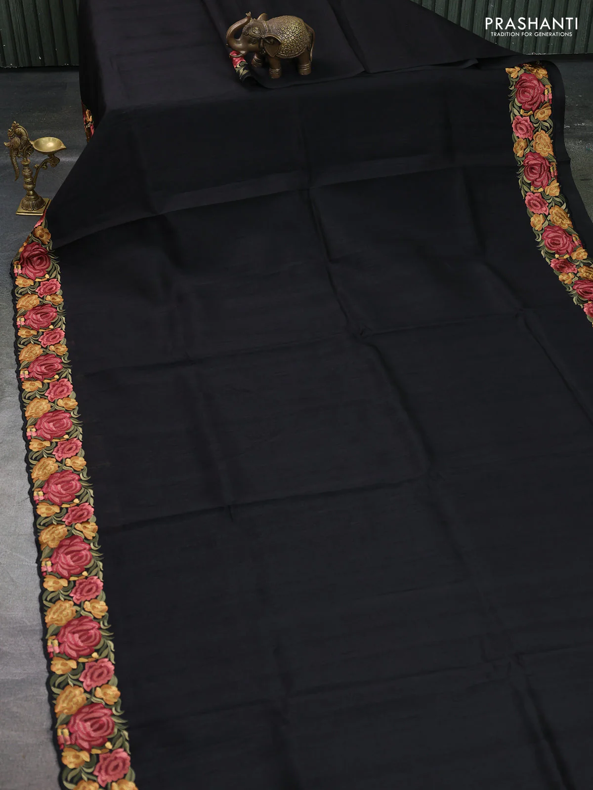 Art tussar saree black with plain body and floral embroidery border - Image 2