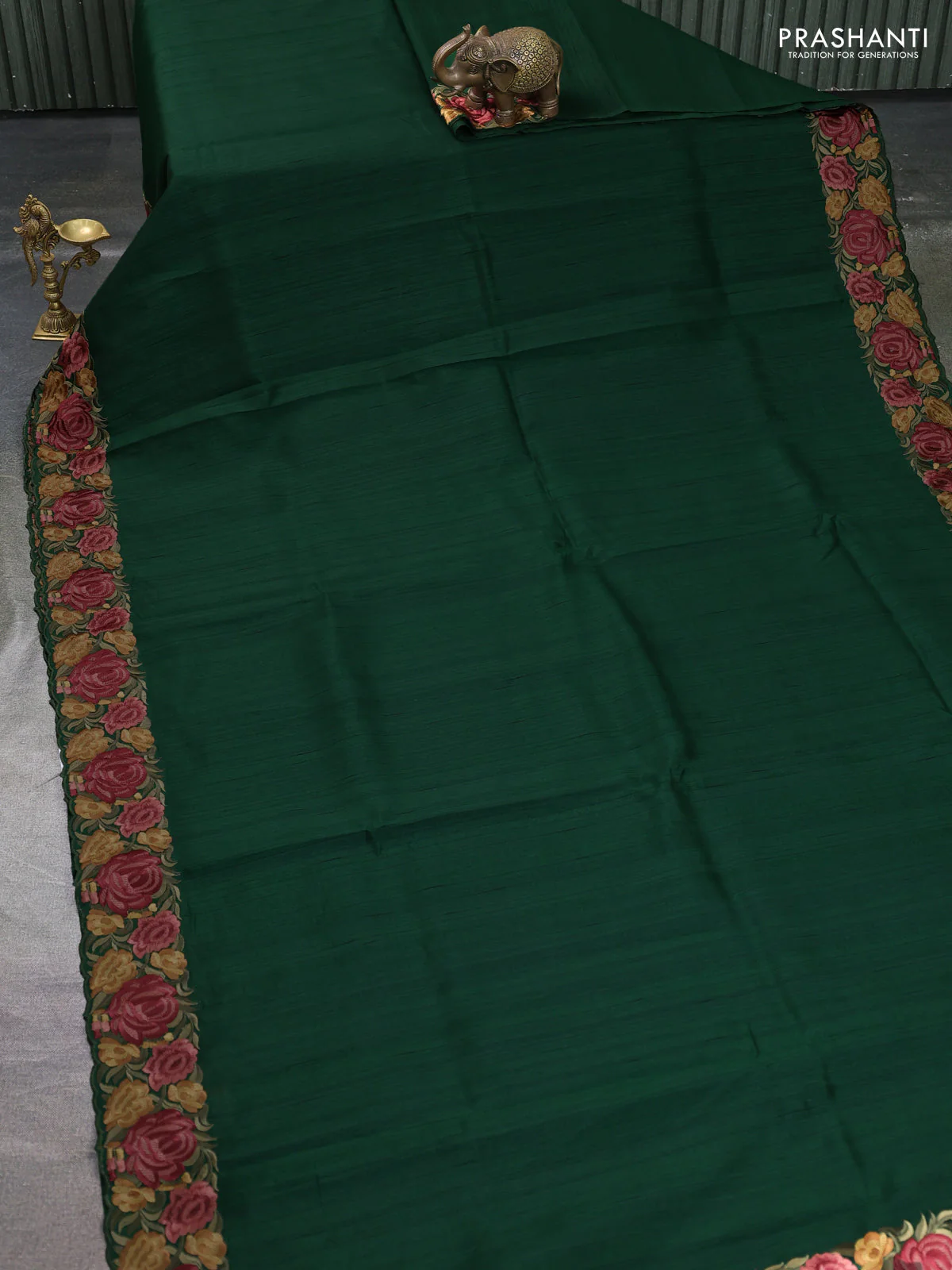 Art tussar saree green with plain body and floral embroidery border - Image 2