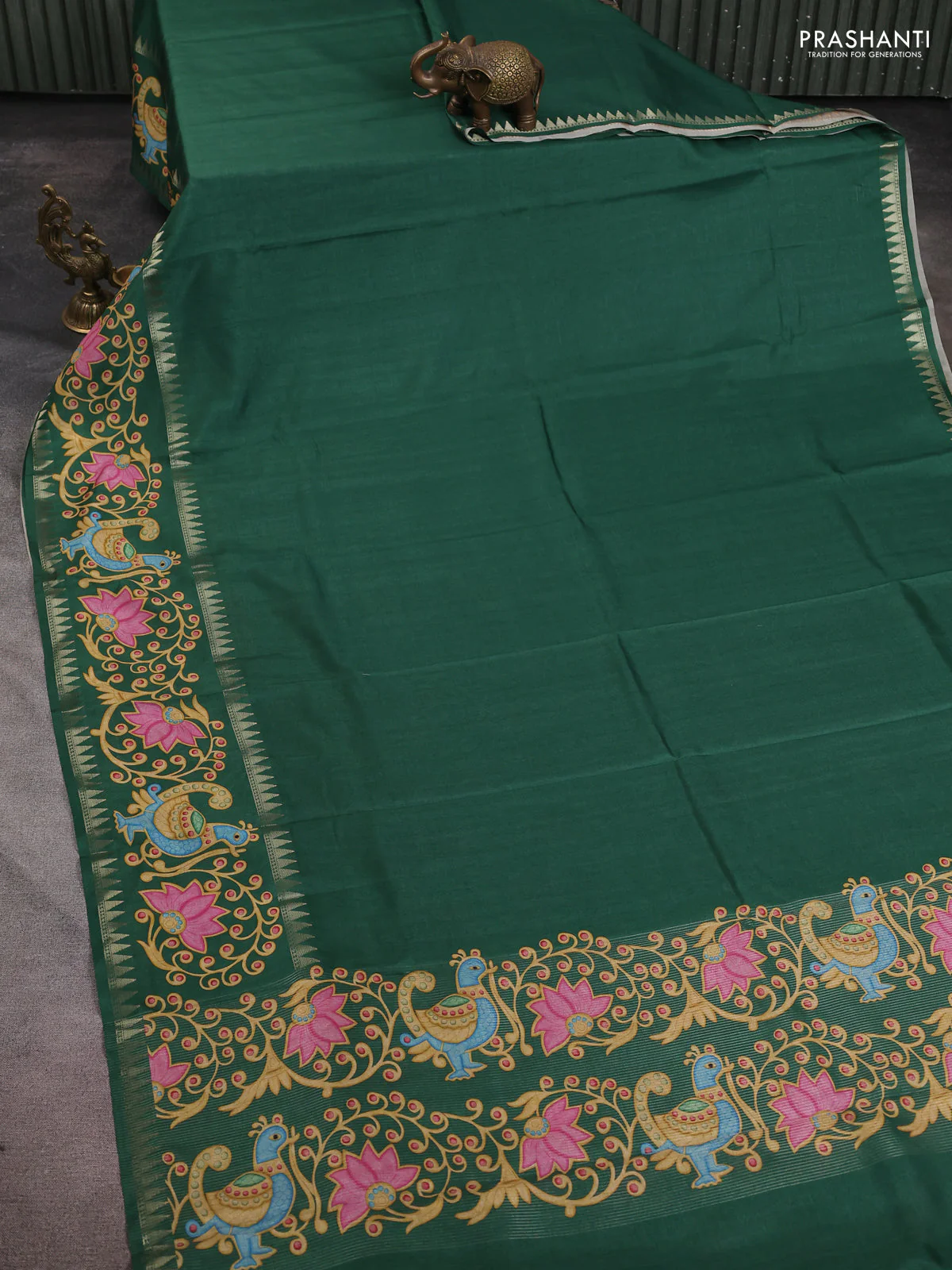 Art tussar saree green with plain body and tanjore printed border - Image 2