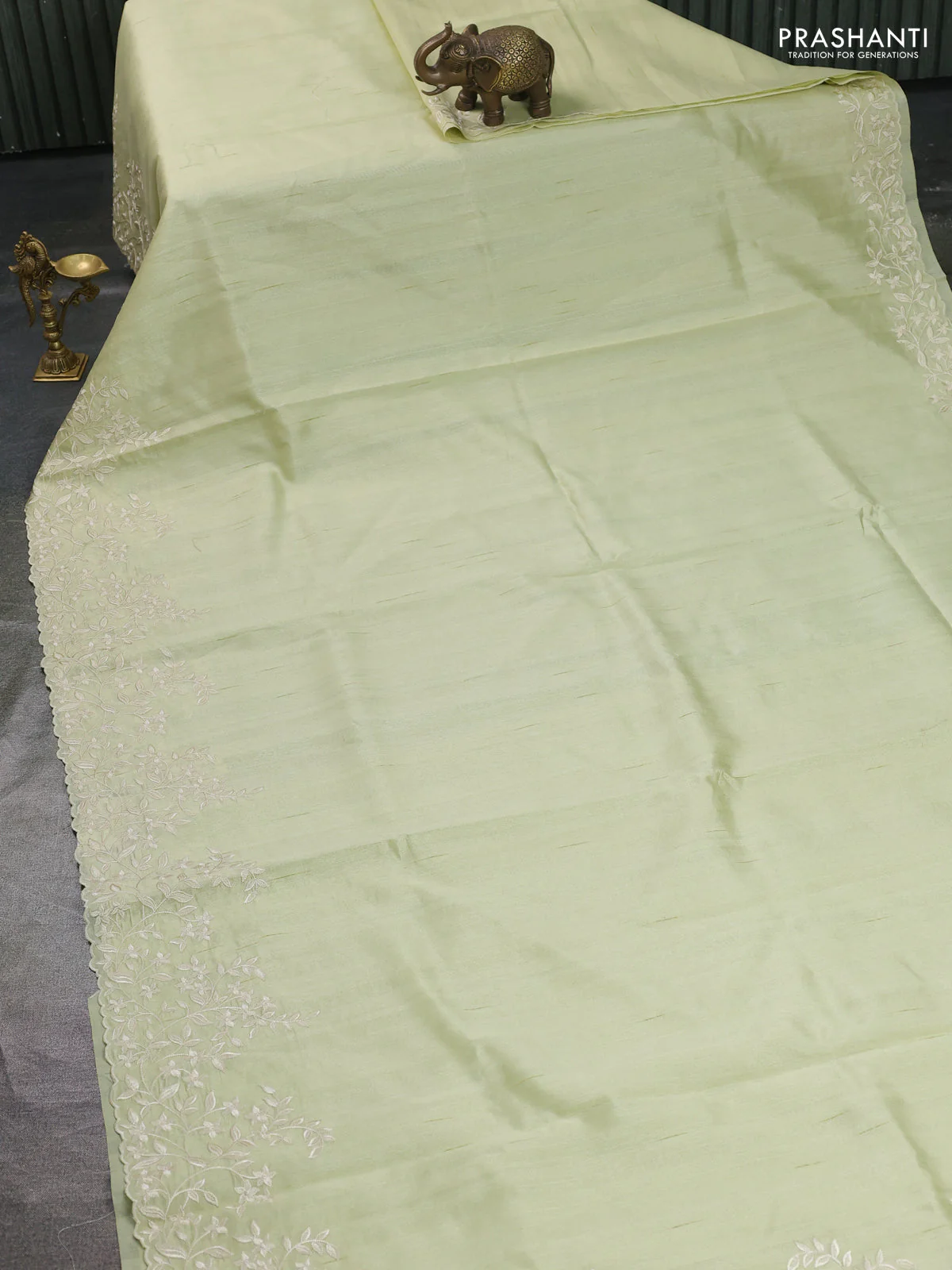 Art tussar saree mild pista green with plain body and floral embroidery border - Image 2