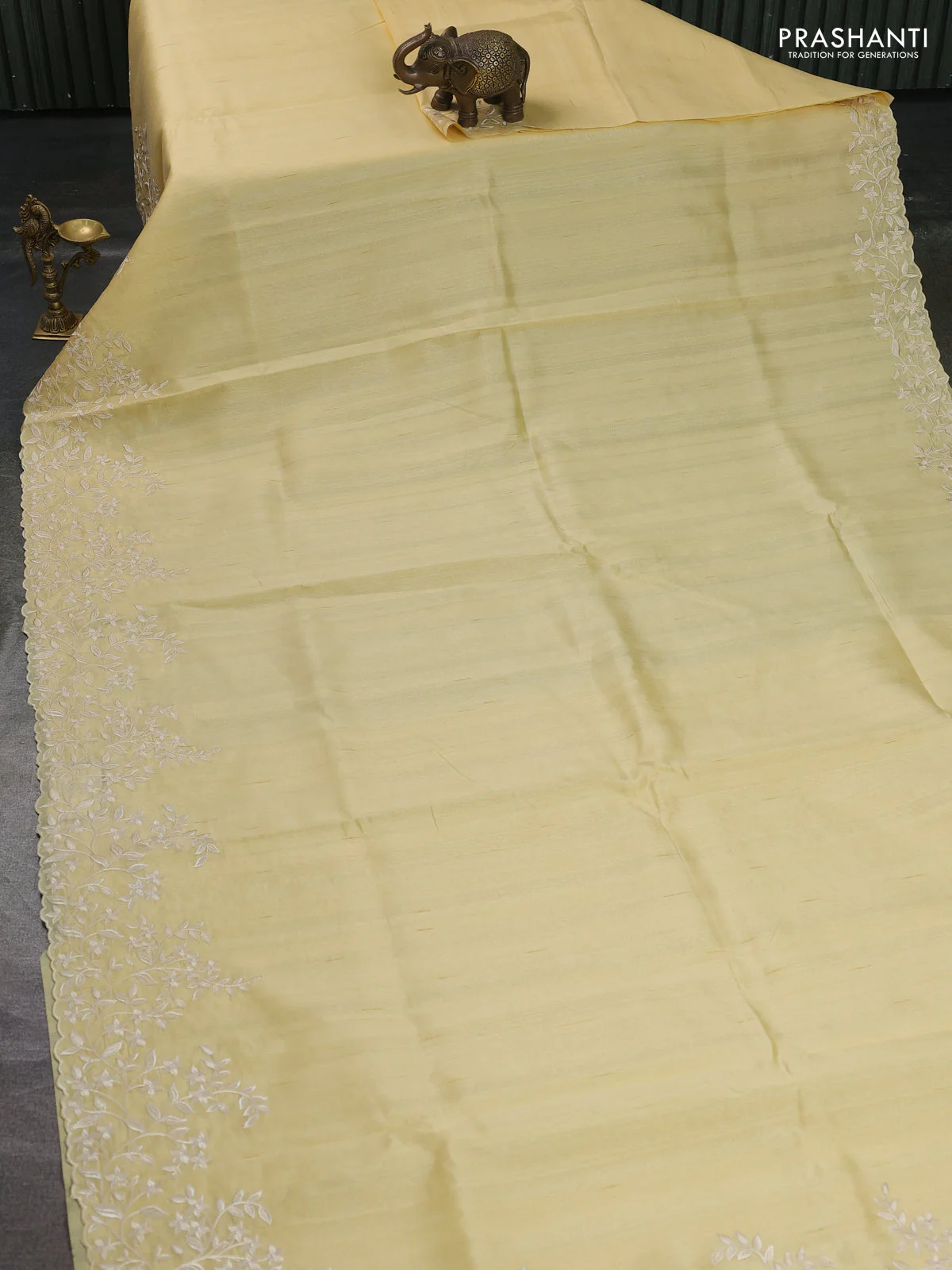 Art tussar saree pale yellow with plain body and floral embroidery border - Image 2