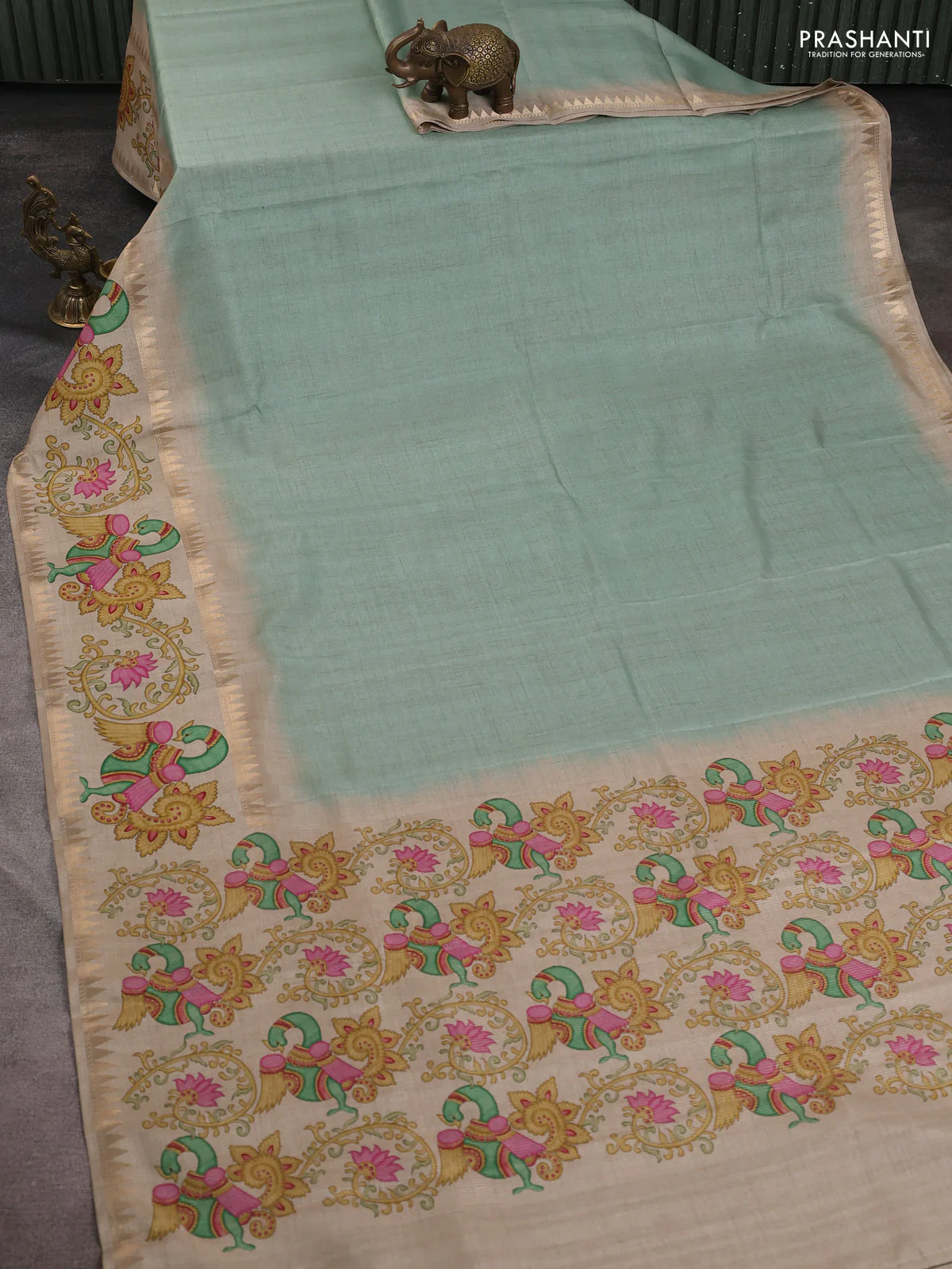 Art tussar saree pastel green and beige with plain body and tanjore printed border - Image 2