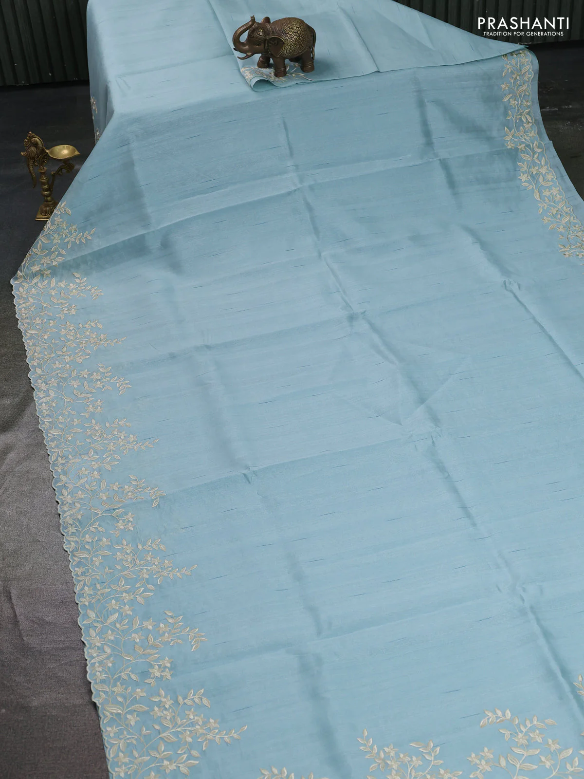 Art tussar saree patel blue with plain body and floral embroidery border - Image 2