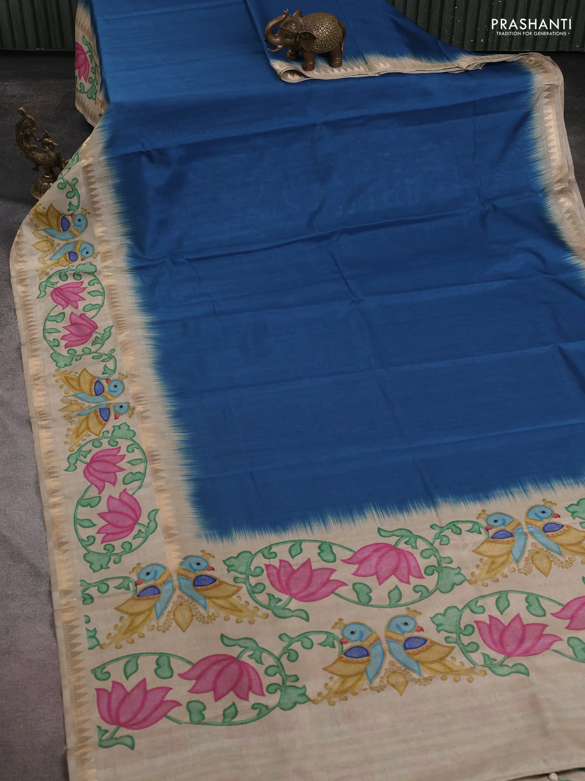Art tussar saree peacock blue and beige with plain body and tanjore printed border - Image 2