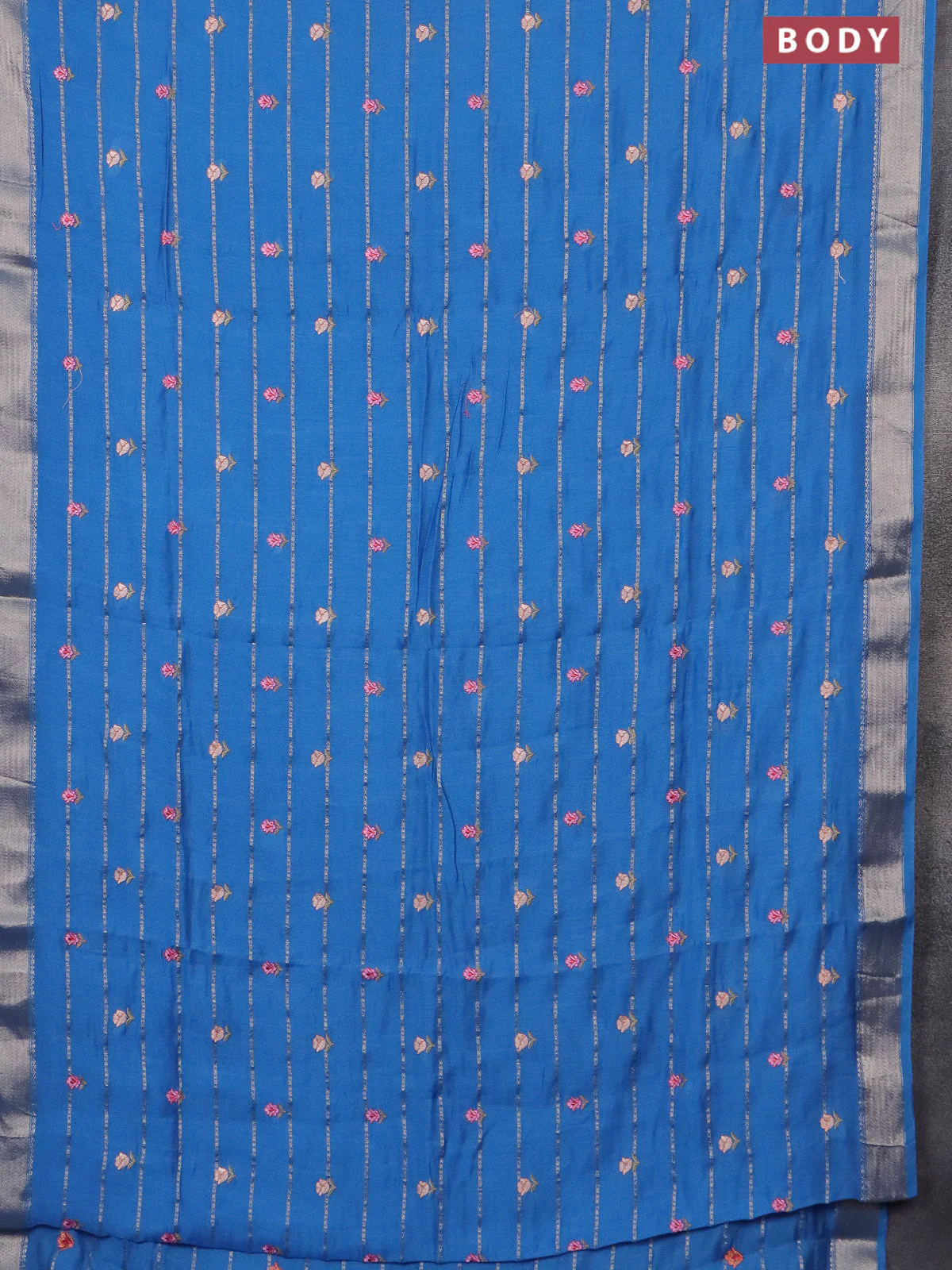 Assam silk saree cs blue with allover zari weaves & embroidery work buttas and zari woven border - Image 2