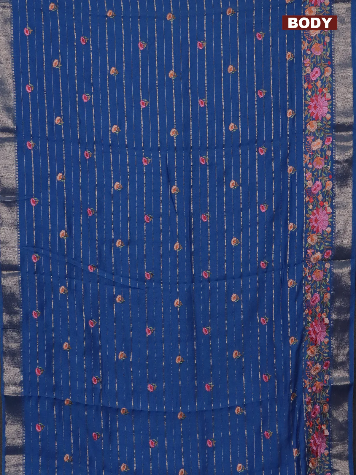 Assam silk saree cs blue with allover zari weaves & floral embroidery work buttas and zari woven border - Image 2