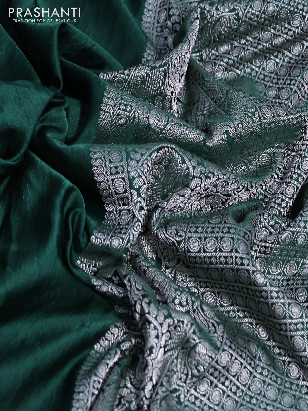 Banarasi crush crepe saree dark green with plain body and silver zari woven border - Image 3
