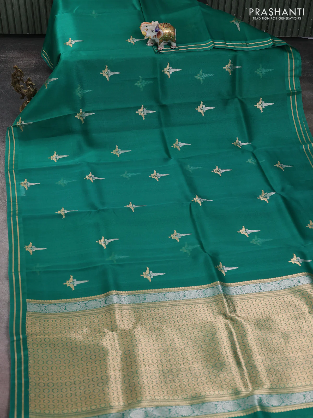 Banarasi organza silk saree green shade with zari woven buttas and zari woven border - Image 2