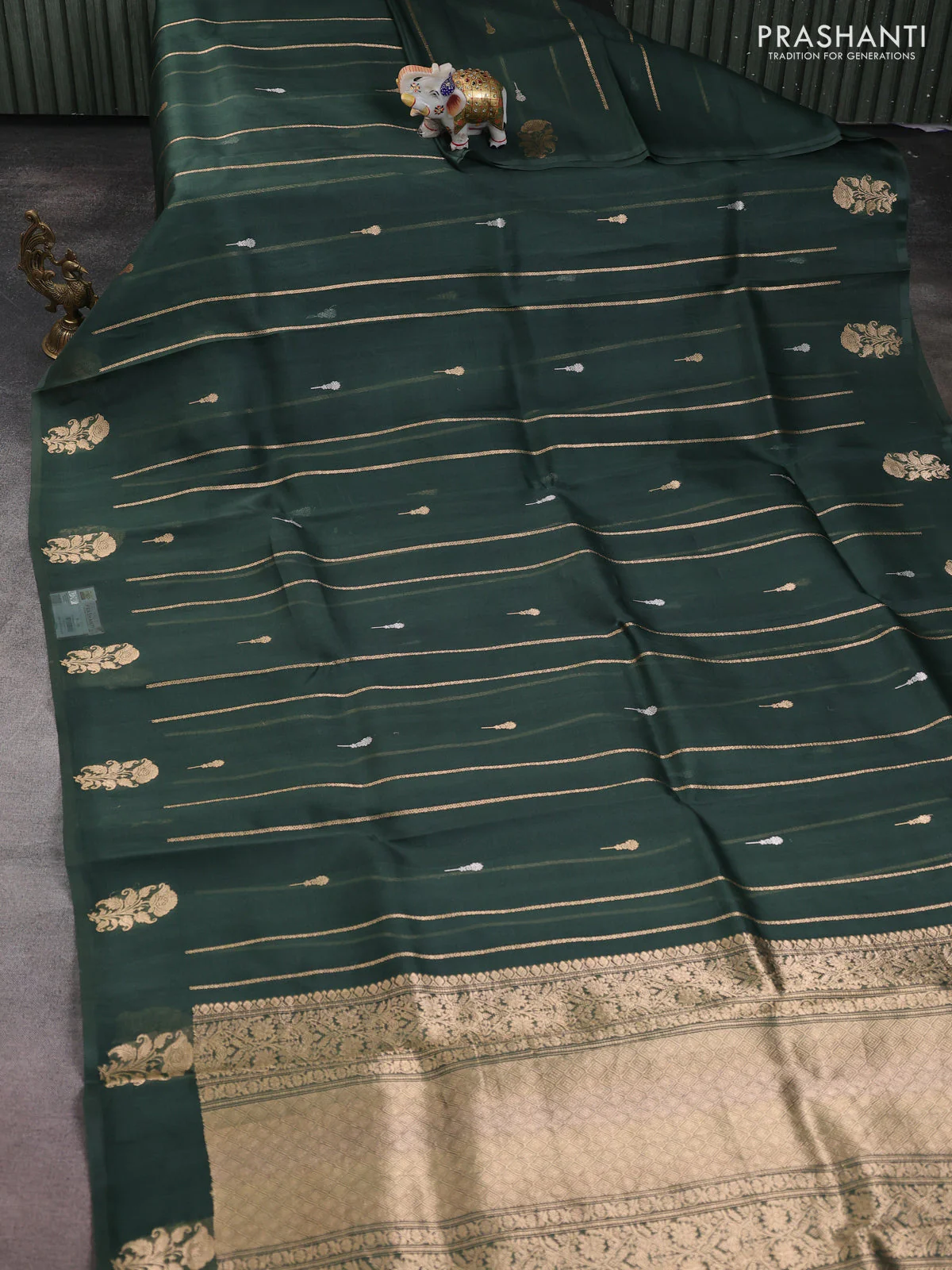 Banarasi organza silk saree greyish green with allover zari stripes pattern & buttas and piping border - Image 2