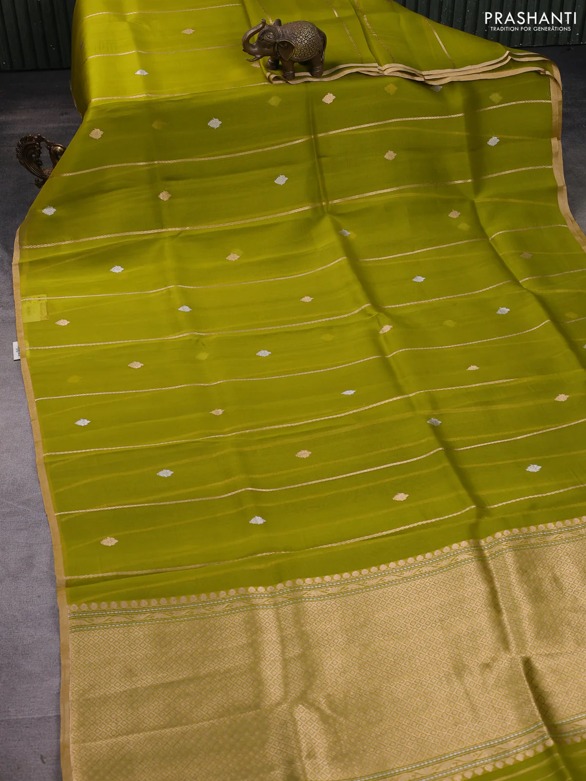 Banarasi organza silk saree lime green with allover zari stripes pattern & butas and zari woven border - Image 2
