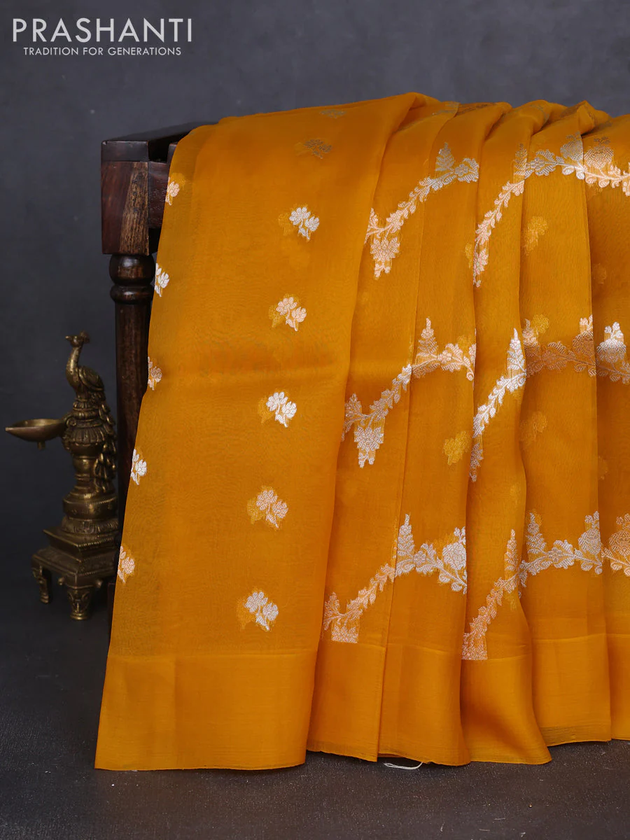 Banarasi organza silk saree mustard yellow with allover silver & gold zari weaves and simple border
