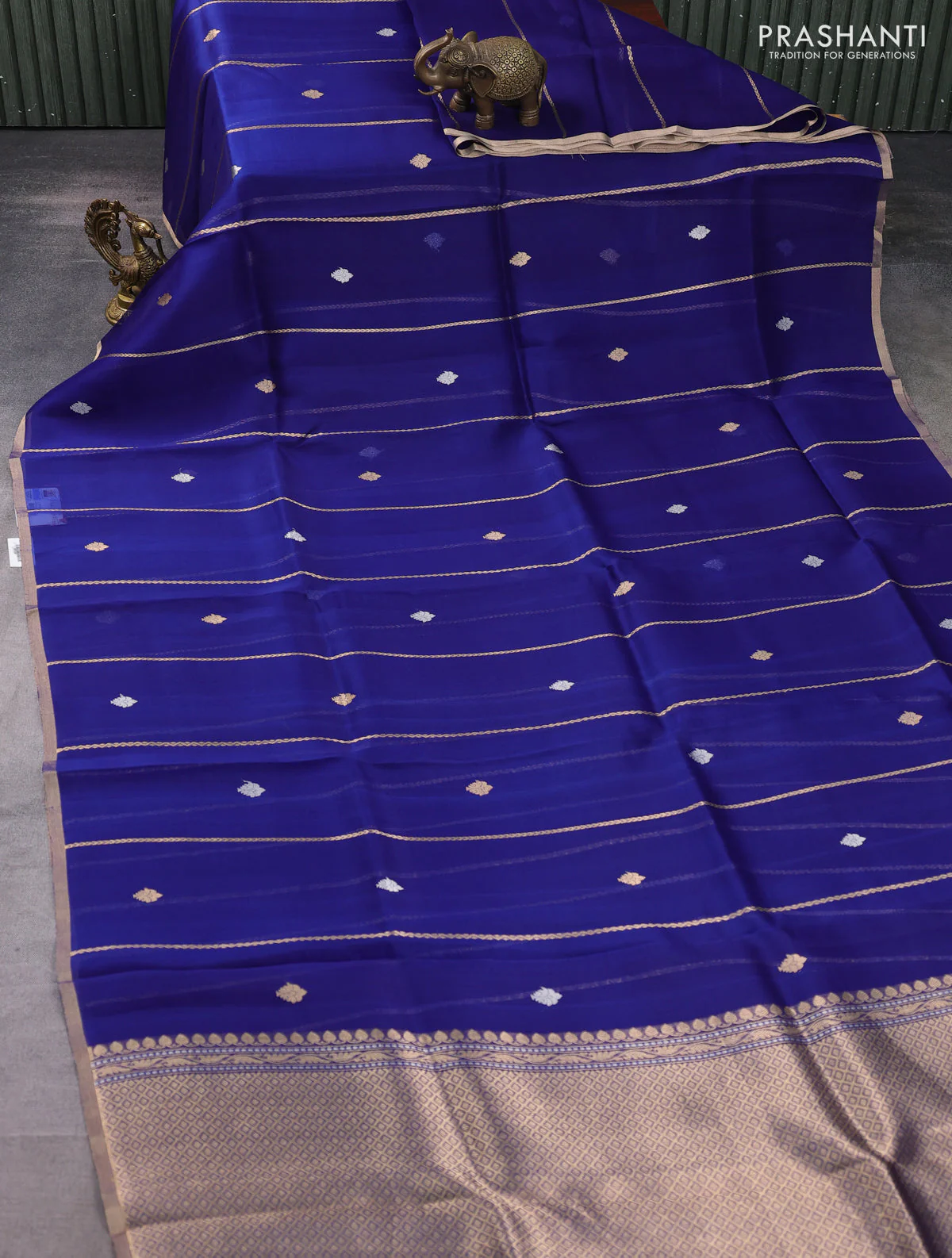 Banarasi organza silk saree navy blue with allover zari stripes pattern & butas and zari woven border - Image 2