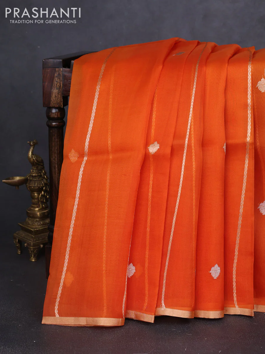 Banarasi organza silk saree orange with allover zari stripes pattern & butas and zari woven border