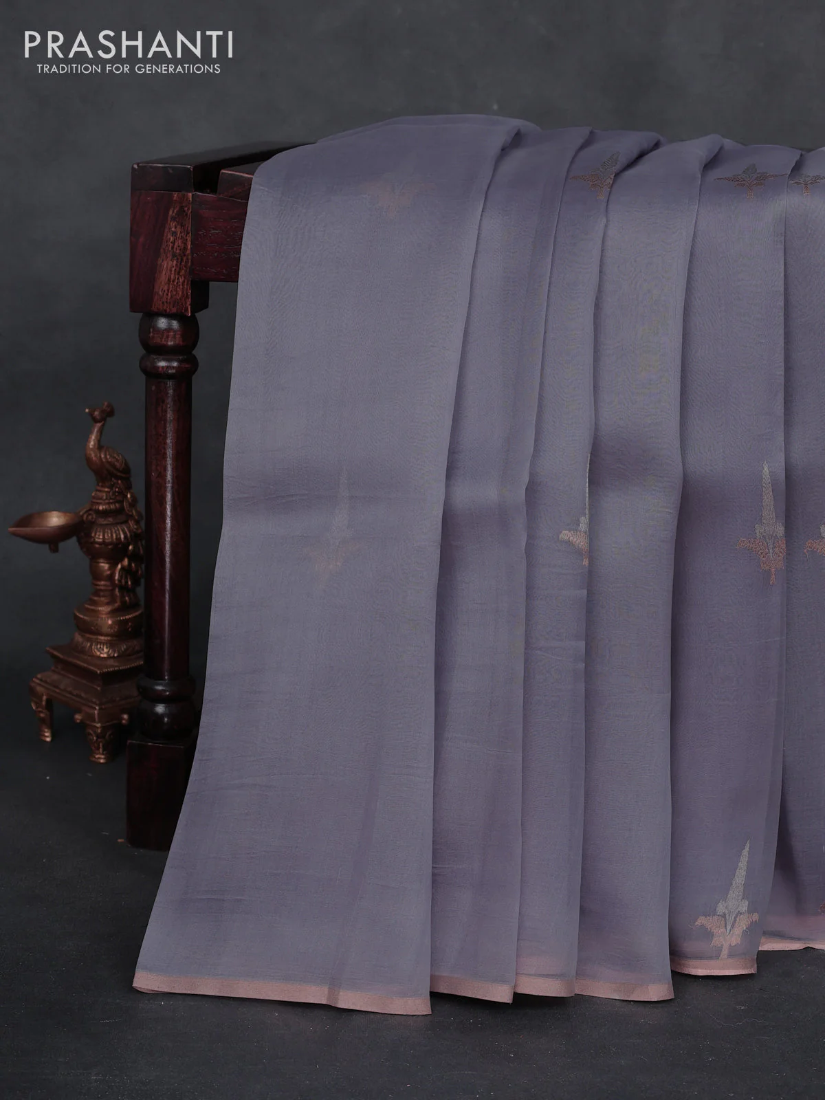 Banarasi organza silk saree pastel lavender with zari woven buttas and zari woven piping border