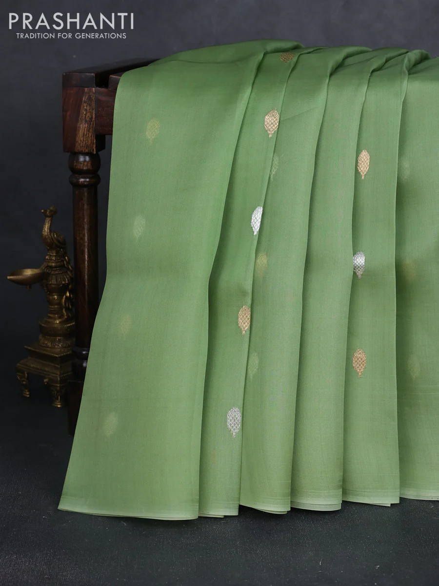 Banarasi organza silk saree pista green with allover zari weaves and piping border