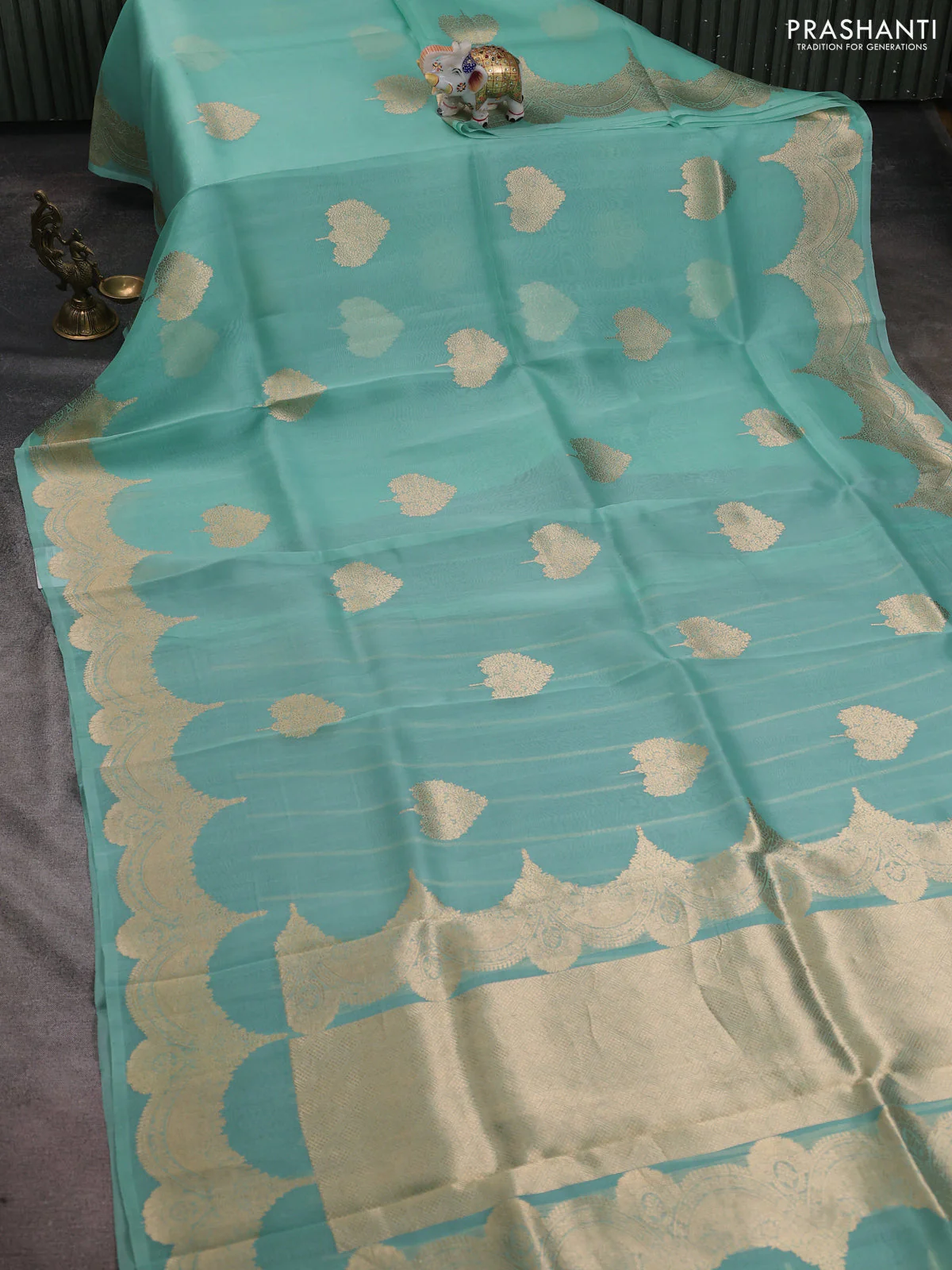 Banarasi organza silk saree teal blue with zari woven buttas and zari woven border - Image 2