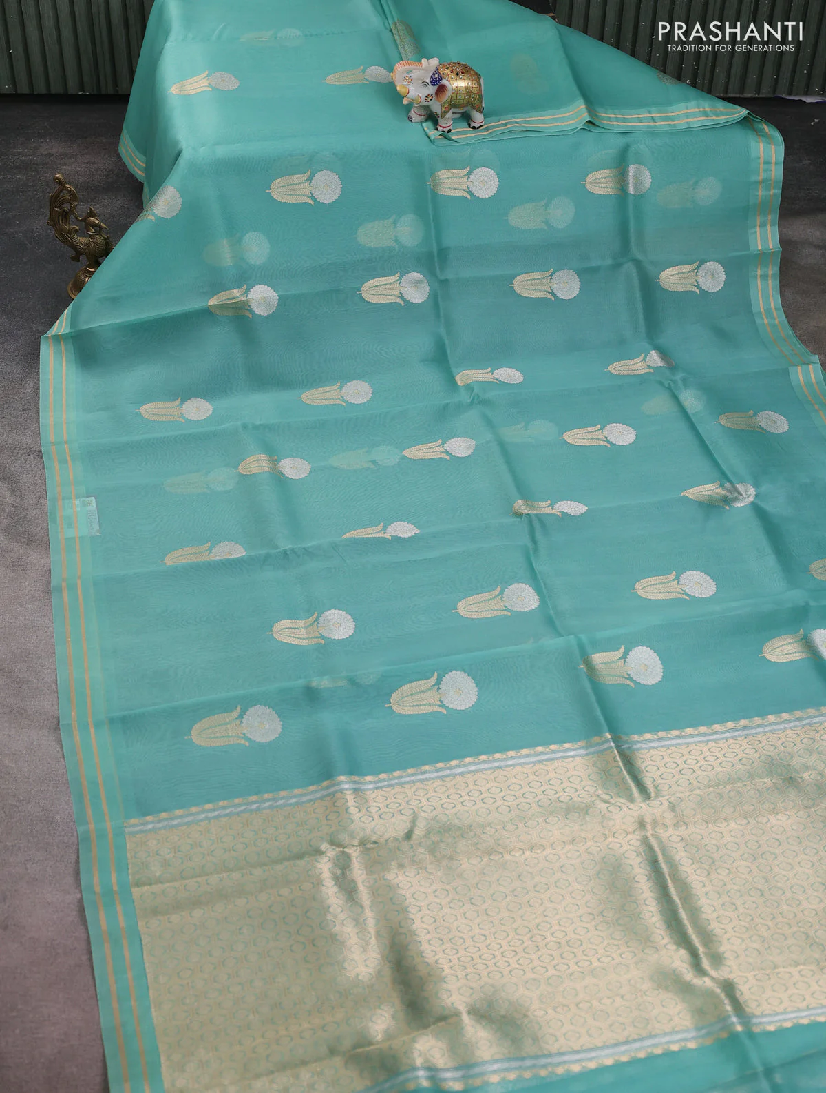 Banarasi organza silk saree teal green with floral zari woven buttas and zari woven border - Image 2