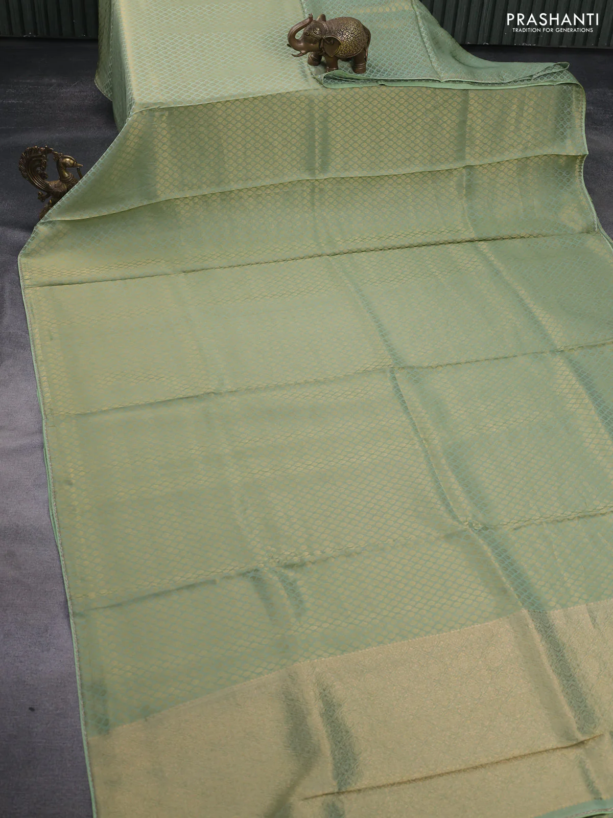 Banarasi semi crepe saree pastel green with allover zari woven brocade weaves and lace work border - Image 2