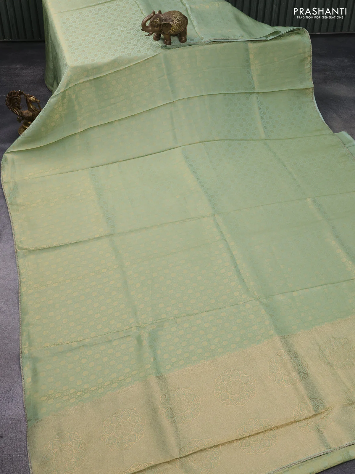 Banarasi semi crepe saree pastel green with allover zari woven brocade weaves and lace work border - Image 2