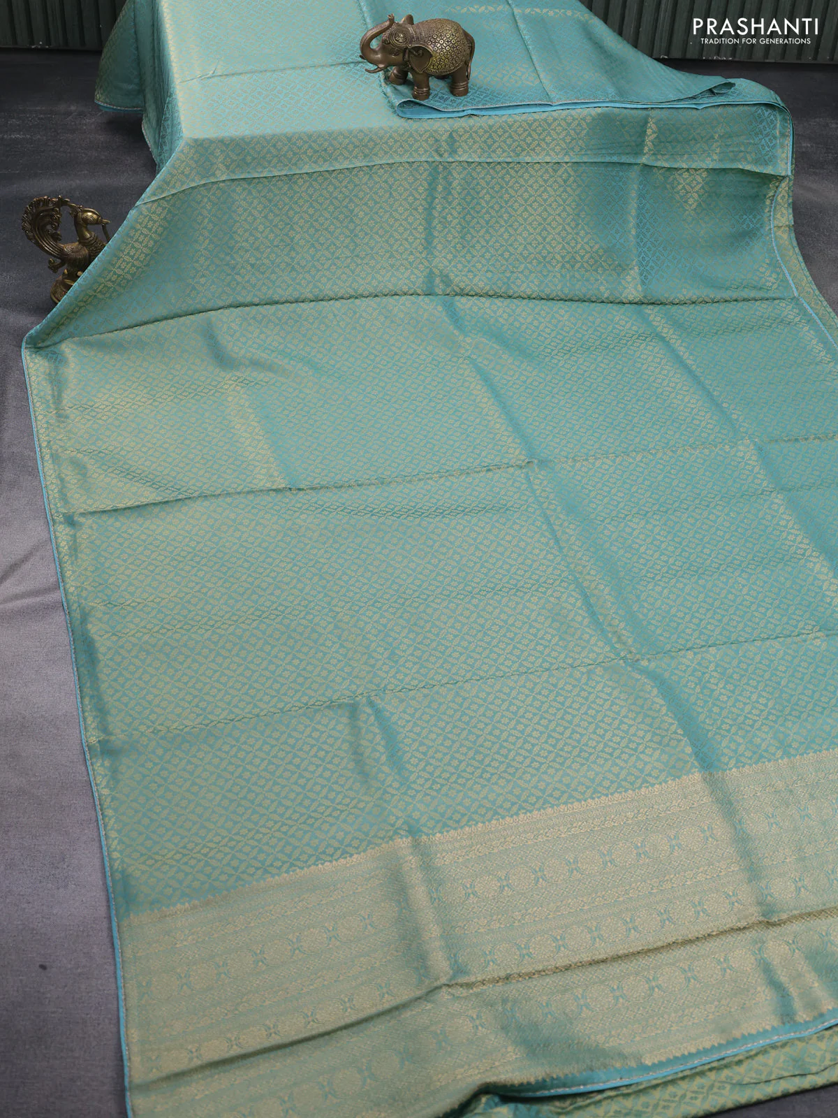 Banarasi semi crepe saree teal blue shade with allover zari woven brocade weaves and lace work border - Image 2