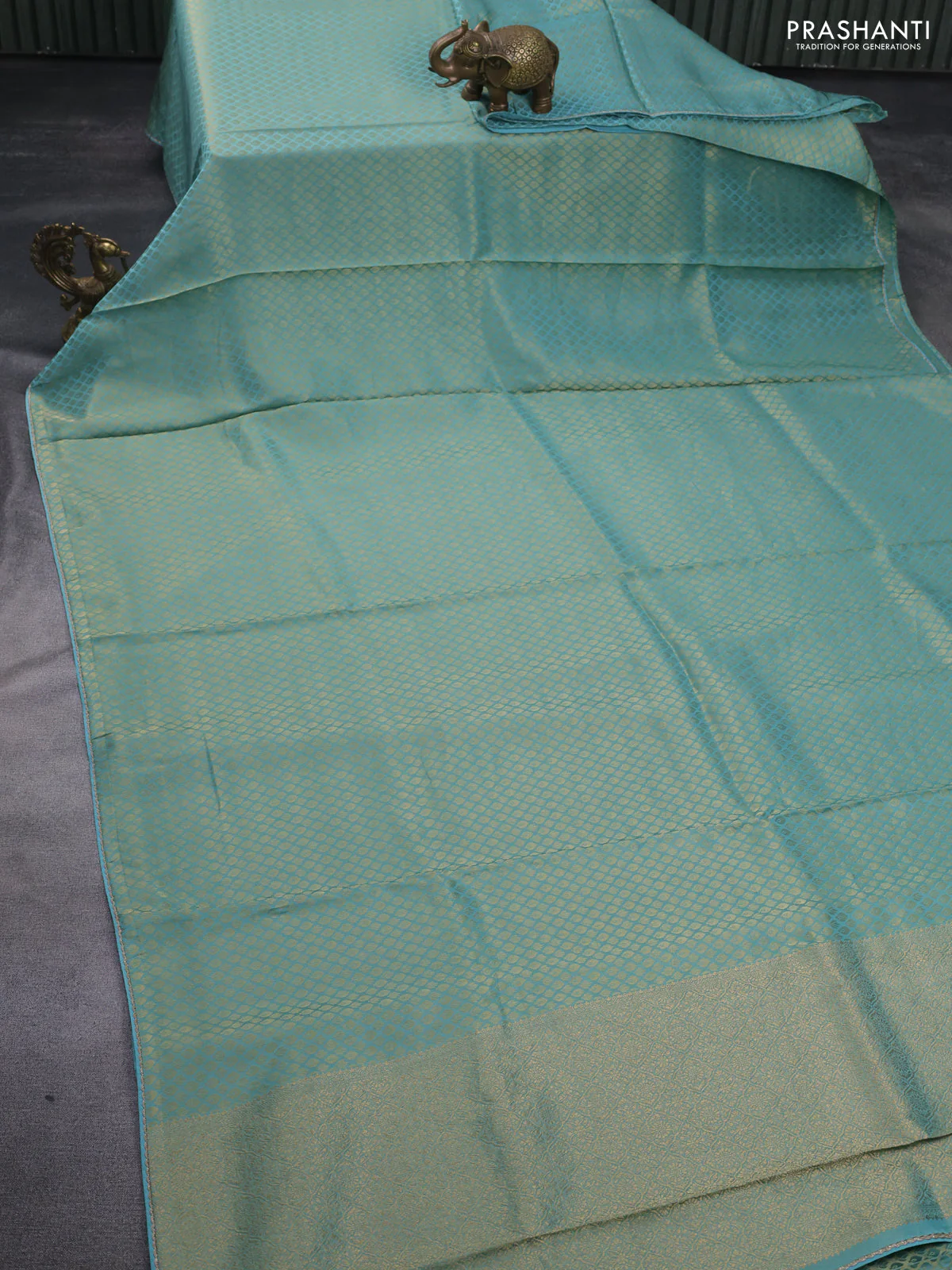 Banarasi semi crepe saree teal blue shade with allover zari woven brocade weaves and lace work border - Image 2