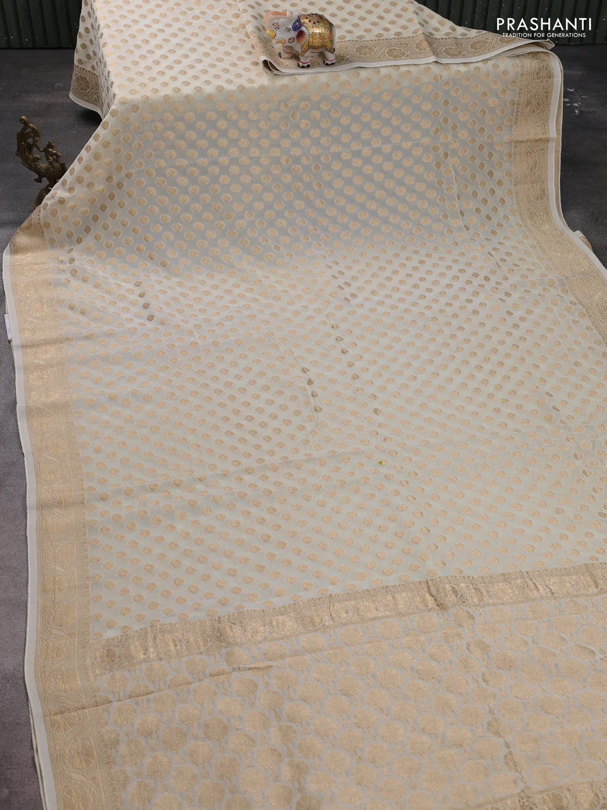 Banarasi semi georgette saree off white with allover zari woven buttas and zari woven border - Image 2