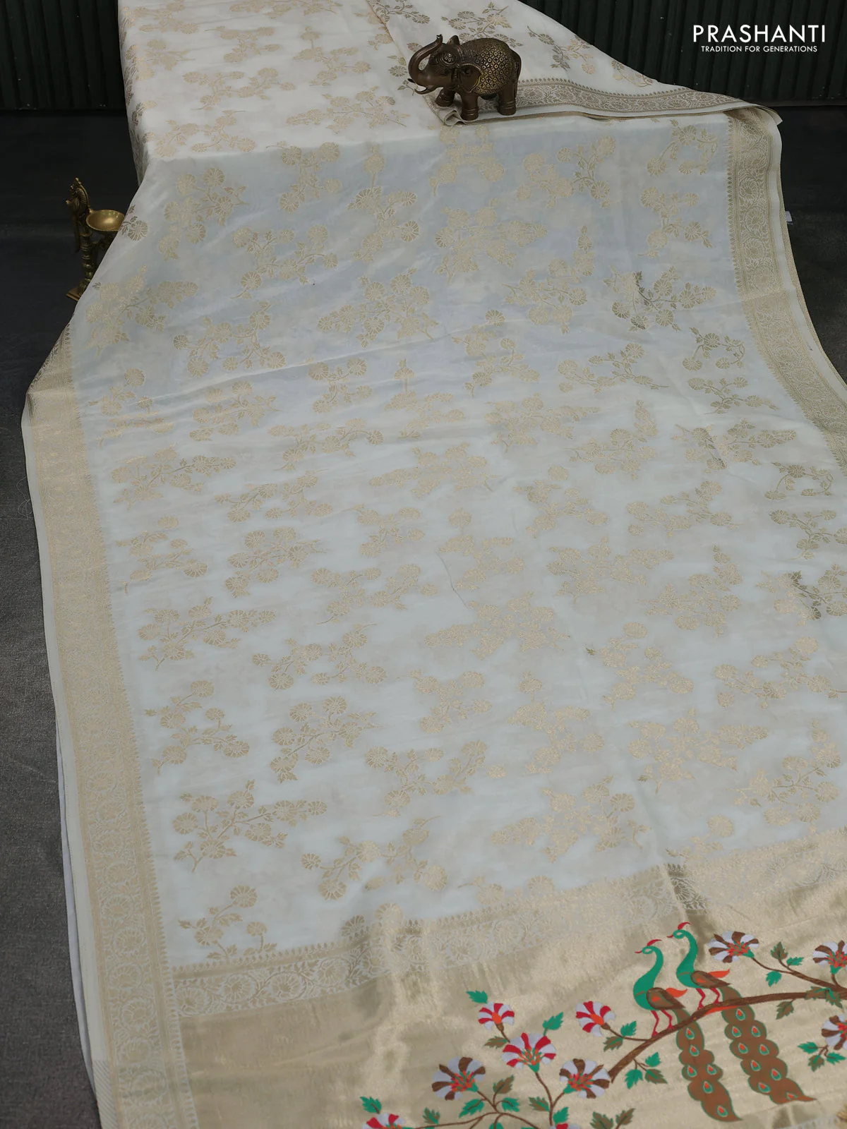Banarasi semi georgette saree off white with allover zari woven floral brocade weaves and zari woven border - Image 2