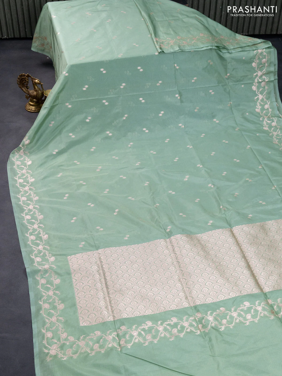Banarasi semi katan saree pastel green with allover woven buttas and woven border - Image 2