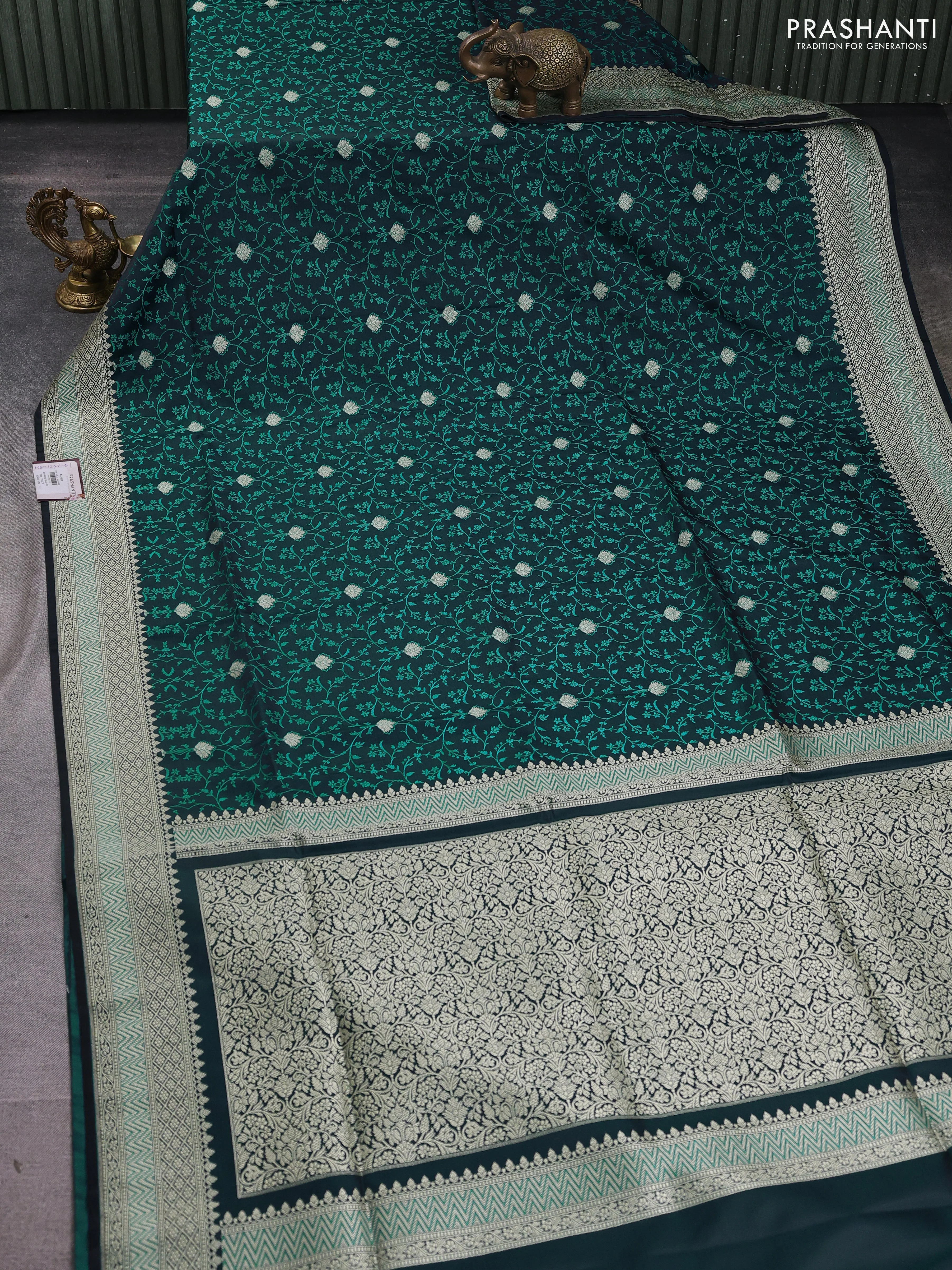 Banarasi semi katan silk saree black and teal green with allover self emboss & zari buttas and zari woven border - Image 2