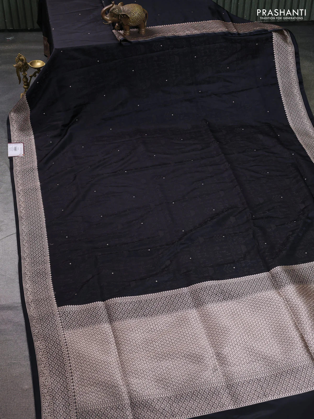 Banarasi semi katan silk saree black with allover self emboss and copper zari woven border - Image 2