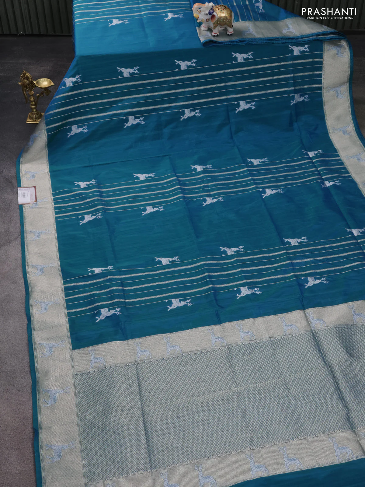 Banarasi semi katan silk saree dual shade of teal bluish green with allover silver & gold zari weaves and deer design zari woven border - Image 2